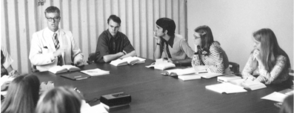 Dr. McArthur leads a class in the early days of the College
